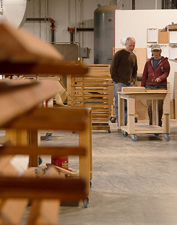 A group of people working in a factory.