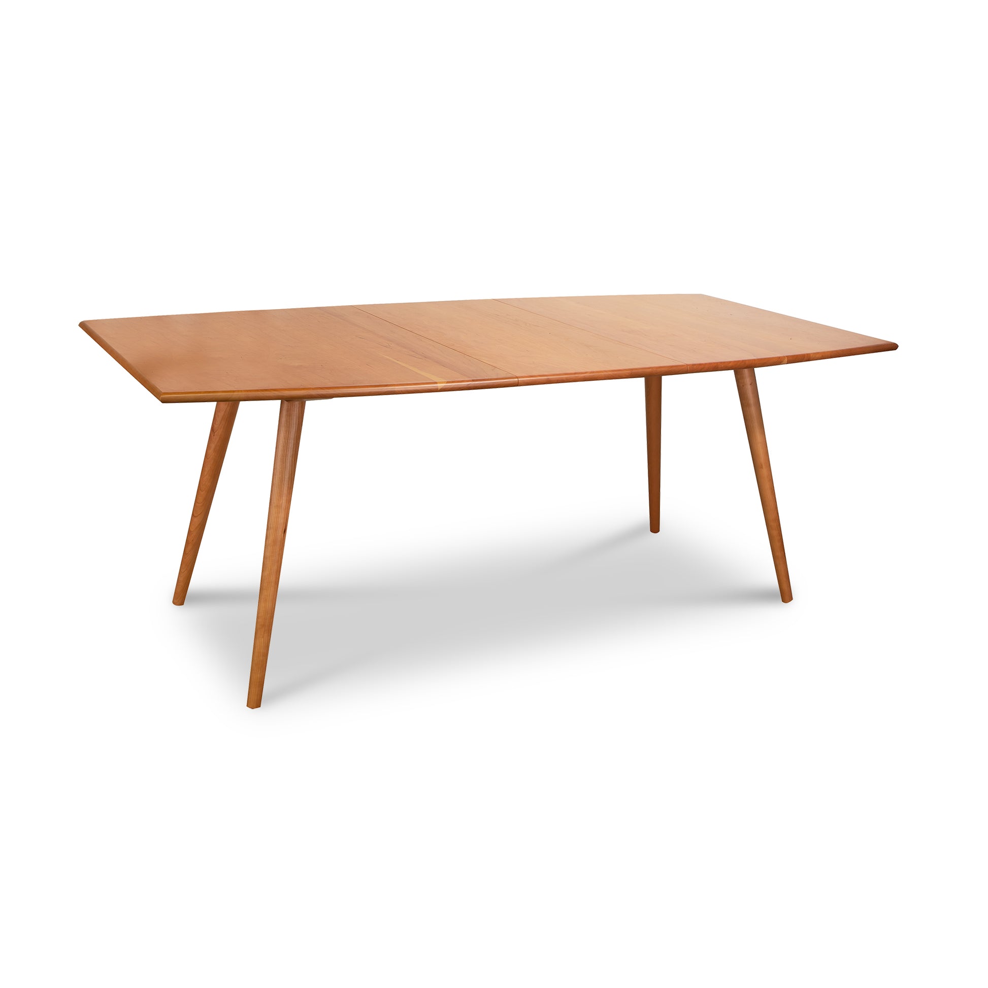 Addison Boat Top Extension Dining Table by Lyndon Furniture featuring a sleek, light brown rectangular wooden top and four elegantly tapered legs.