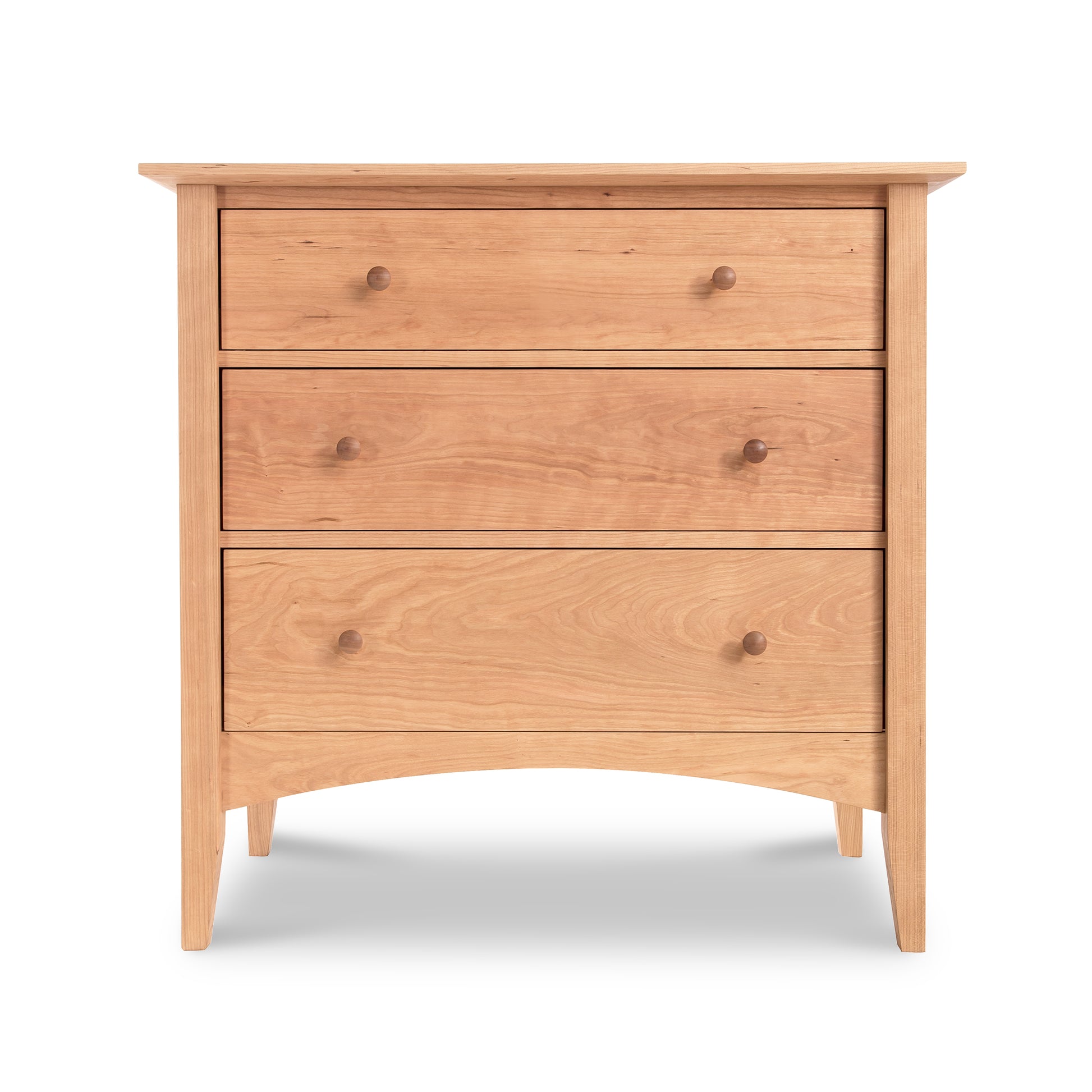 A sustainably harvested Maple Corner Woodworks American Shaker 3-Drawer Chest with round knobs and curved legs, isolated on a white background.