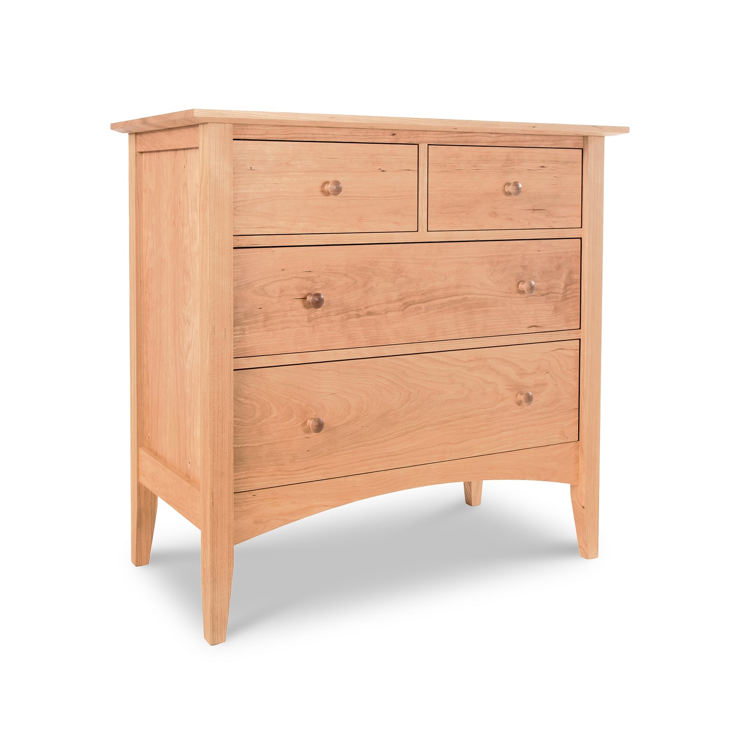 A American Shaker 4-Drawer Chest from the Maple Corner Woodworks furniture collection, with four drawers, featuring a light natural finish and round knobs, set against a plain white background.