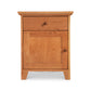An American Country-inspired Lyndon Furniture nightstand made of solid wood, with a single drawer.