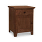 A Lyndon Furniture American Country 1-Drawer Nightstand with Door with a solid wood drawer.