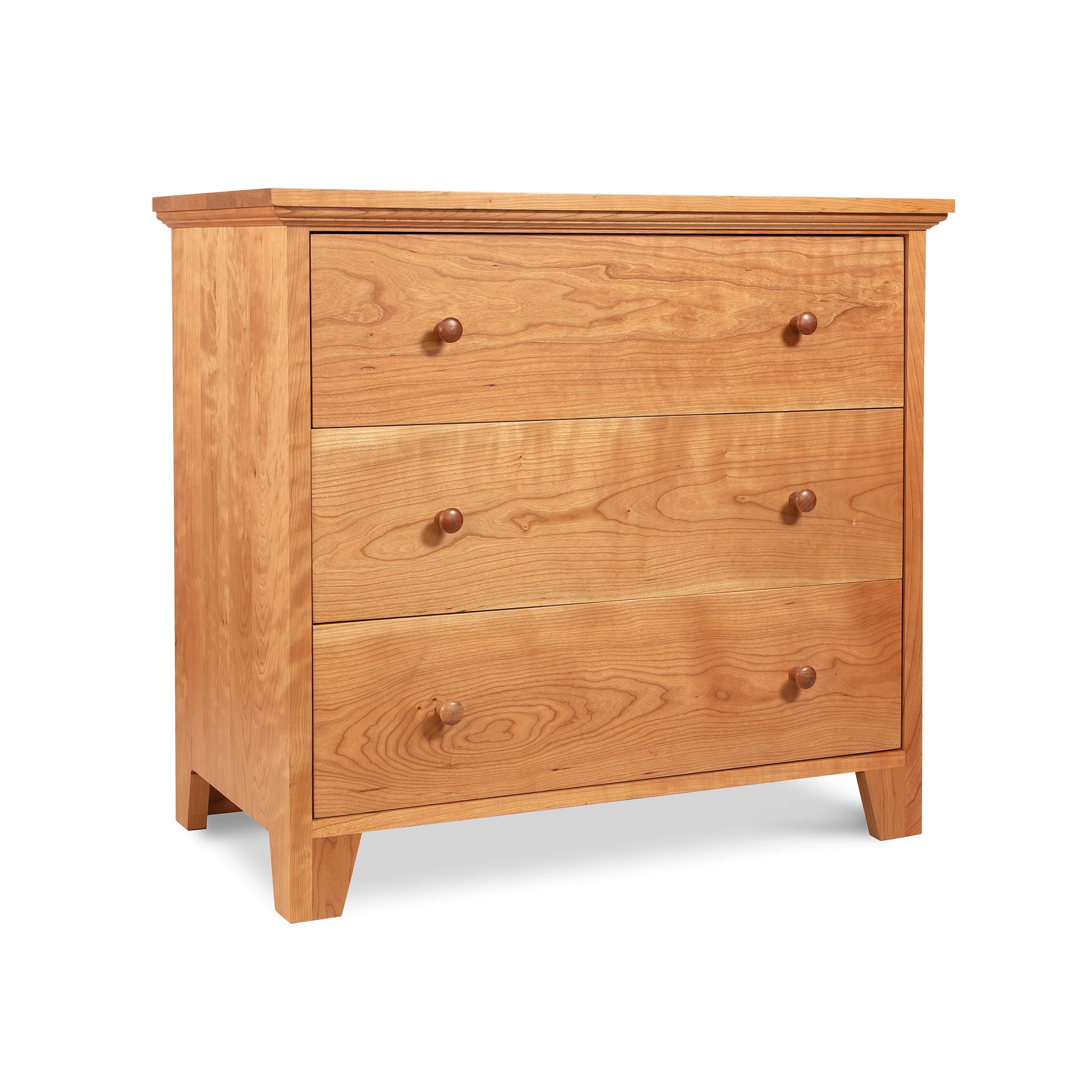Lyndon Furniture American Country 3-Drawer Chest with natural finish and eco-friendly design on four tapered legs.
