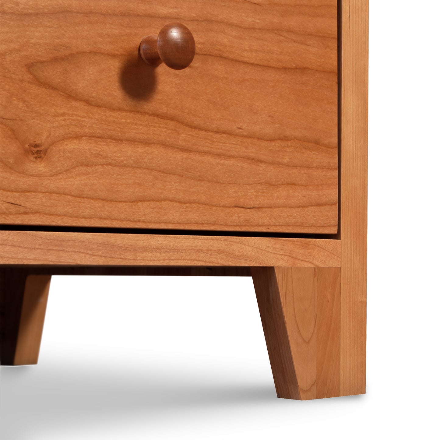 American Country 5-Drawer Chest by Lyndon Furniture with detailed view of dovetail drawer, round knob, and solid wood grain.