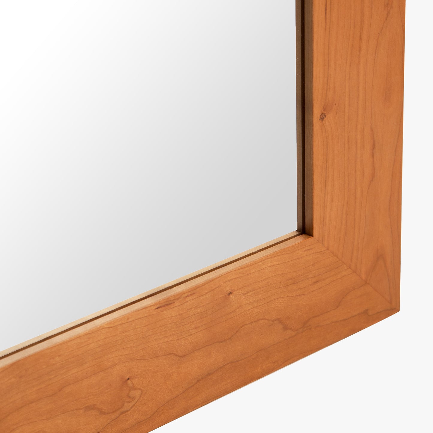 American Country Mirror by Lyndon Furniture with natural cherry wood frame and smooth reflective surface.