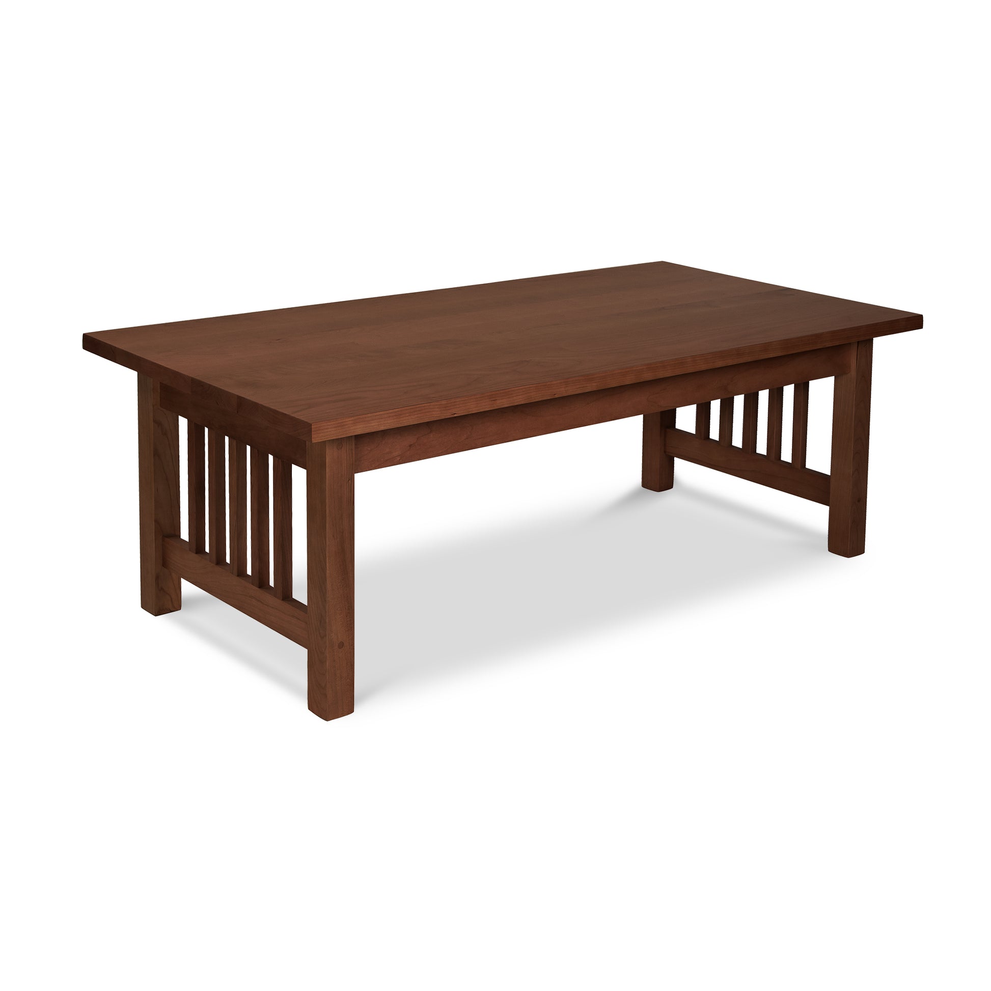 A small wooden American Mission Coffee Table by Lyndon Furniture on a white background, handcrafted and American-made.