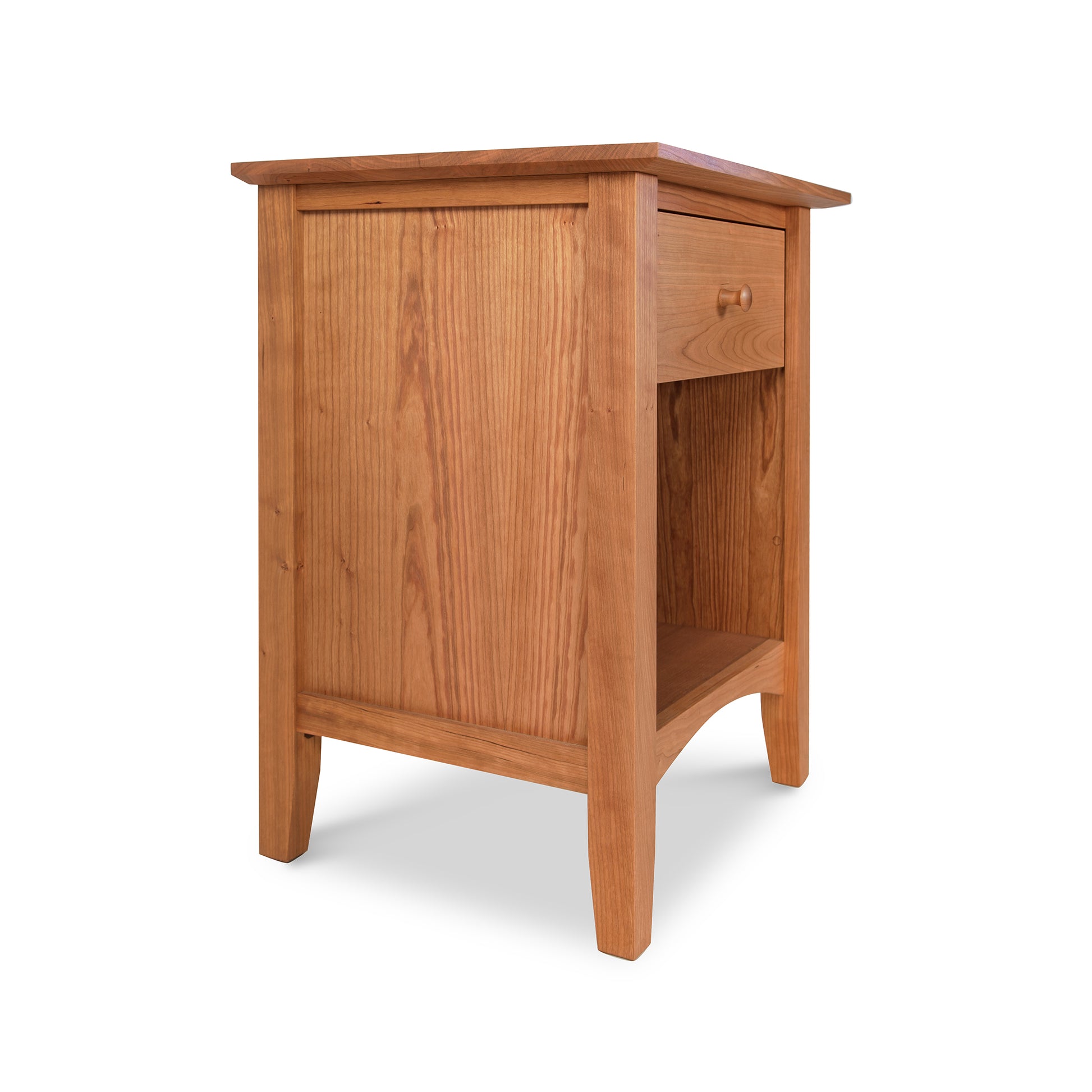 A Maple Corner Woodworks American Shaker 1-Drawer Enclosed Shelf Nightstand made from natural cherry with a smooth finish, featuring a single drawer and an open shelf below, isolated against a white background.