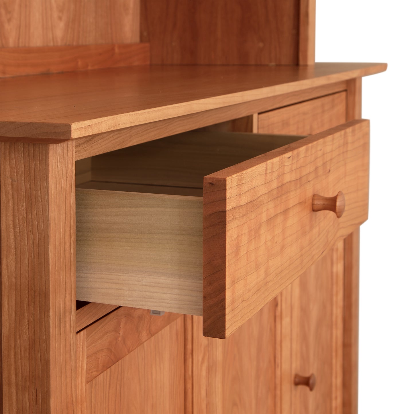 American Shaker 50" China Cabinet by Maple Corner Woodworks showcases fine Vermont craftsmanship with simple wooden knobs and a smooth finish.