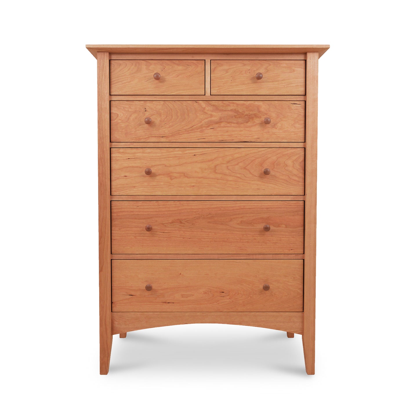 A American Shaker 6-Drawer Chest from Maple Corner Woodworks with six drawers, featuring a natural cherry finish and round knobs. The chest stands upright on four slightly curved legs, isolated on a white background.