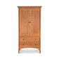 A Maple Corner Woodworks American Shaker Armoire with two upper doors and two lower drawers, set against a plain white background. The furniture features a simple, classic design with rounded knobs.