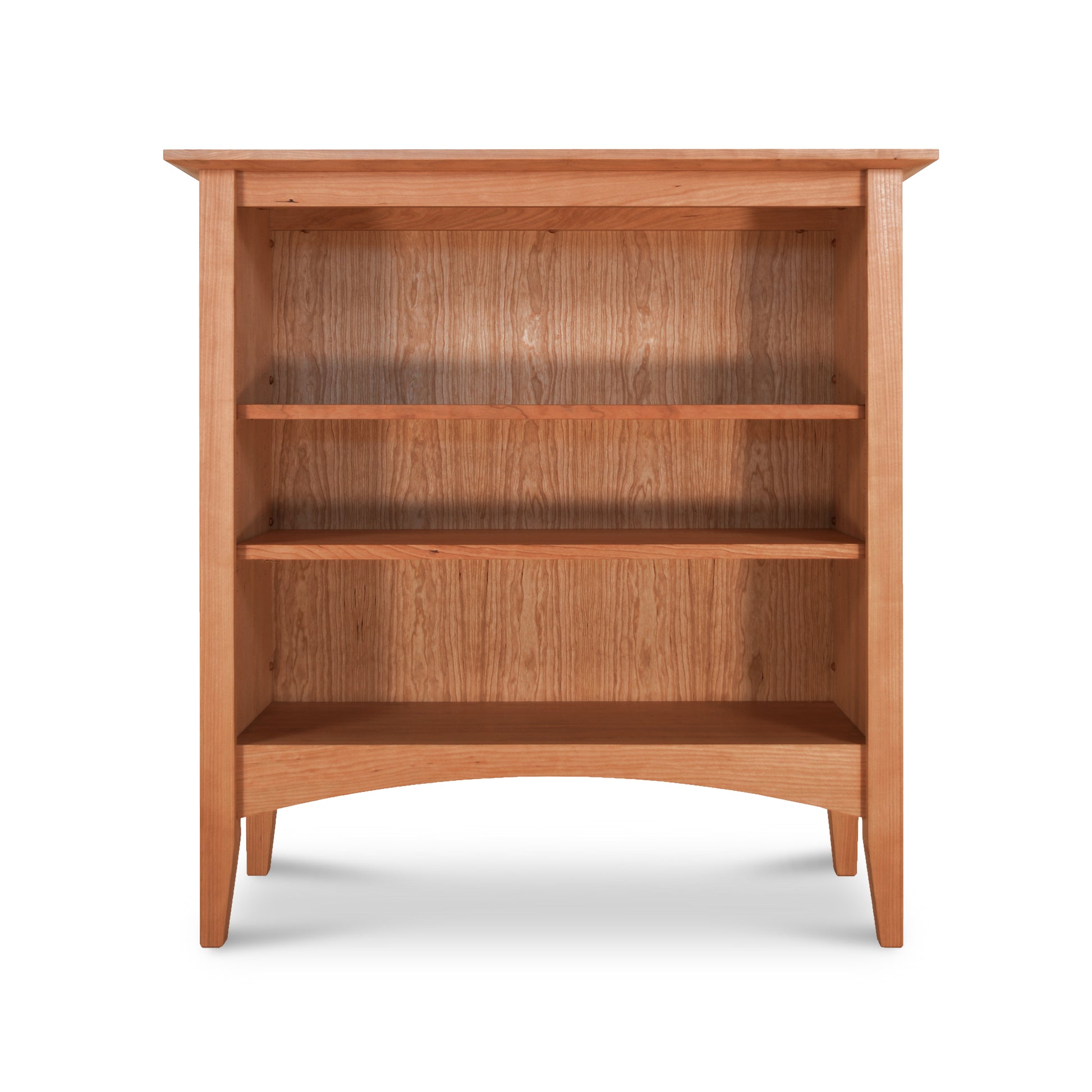 A sustainably harvested American Shaker Bookcase with three shelves, isolated on a white background, by Maple Corner Woodworks.