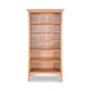 A Maple Corner Woodworks American Shaker Bookcase, constructed from sustainably harvested hardwoods, with five shelves, empty and isolated on a white background.