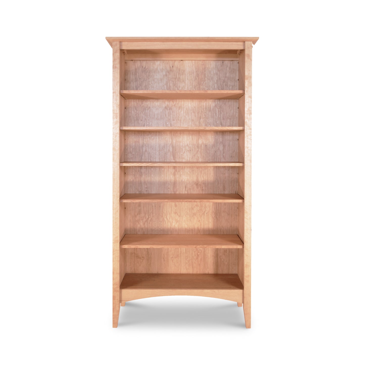 American Shaker Bookcase by Maple Corner Woodworks made of light-colored wood, showcasing six evenly spaced shelves in a tall shaker style.