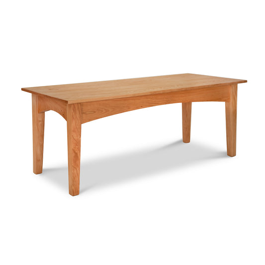 A Maple Corner Woodworks American Shaker Coffee Table, made of solid hardwood with a natural cherry finish, on a white background.