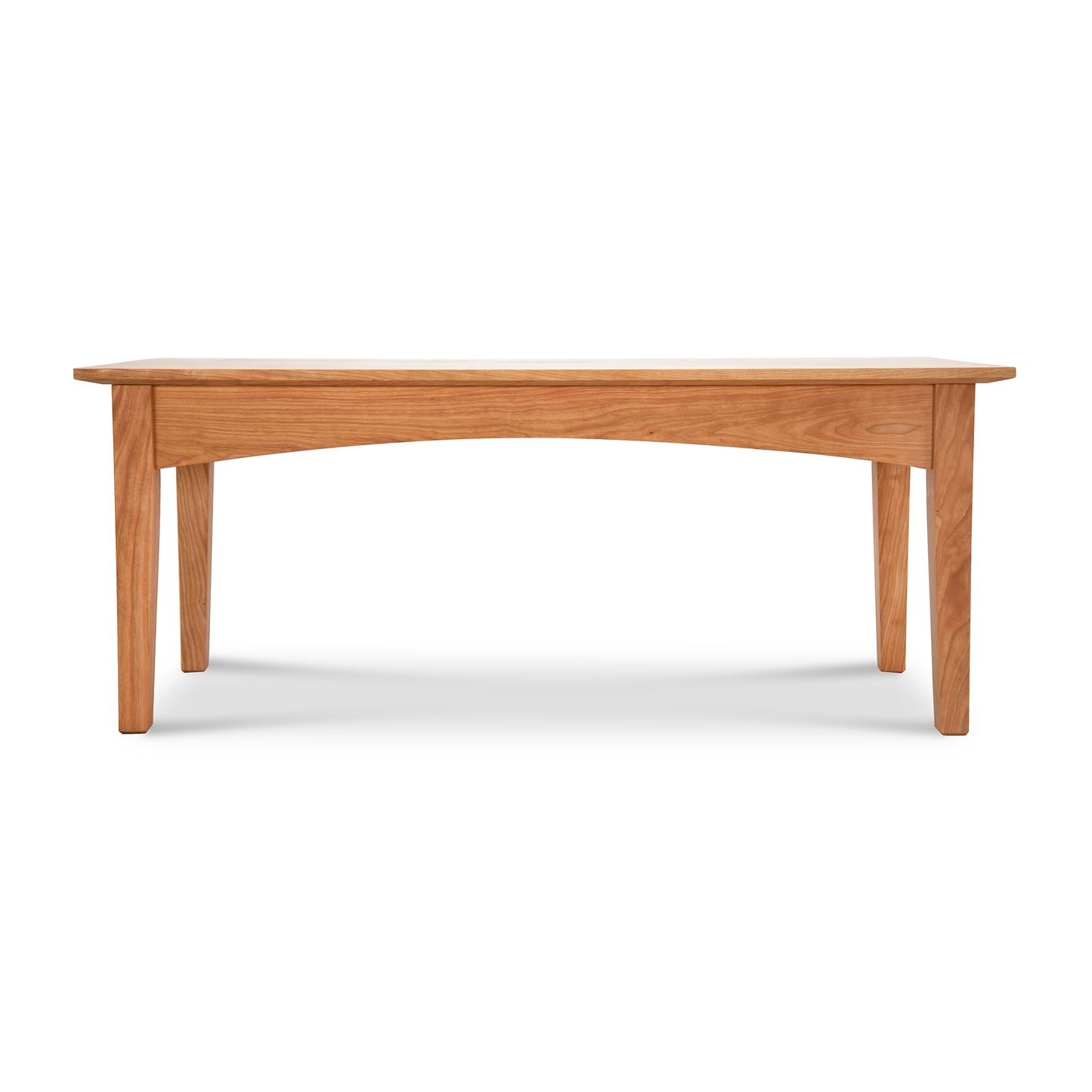 A simple American Shaker Coffee Table made from oak, featuring a rectangular top and gently tapering legs. The table is displayed against a white background as part of the Maple Corner Woodworks American Shaker Furniture Collection.