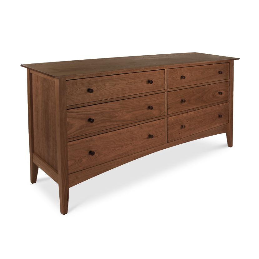 A Maple Corner Woodworks American Shaker 6-Drawer Dresser with slightly tapered legs, isolated on a white background. The dresser features a warm, medium-brown finish with visible wood grain.
