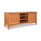 An Maple Corner Woodworks American Shaker 67" TV Stand crafted from solid hardwood, featuring two side cabinets and open shelving in the center, isolated on a white background.