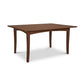 A simple American Shaker Rectangular Solid Top Table from Maple Corner Woodworks with four legs, isolated on a white background. The table is made of dark brown hardwood with a visible grain texture.