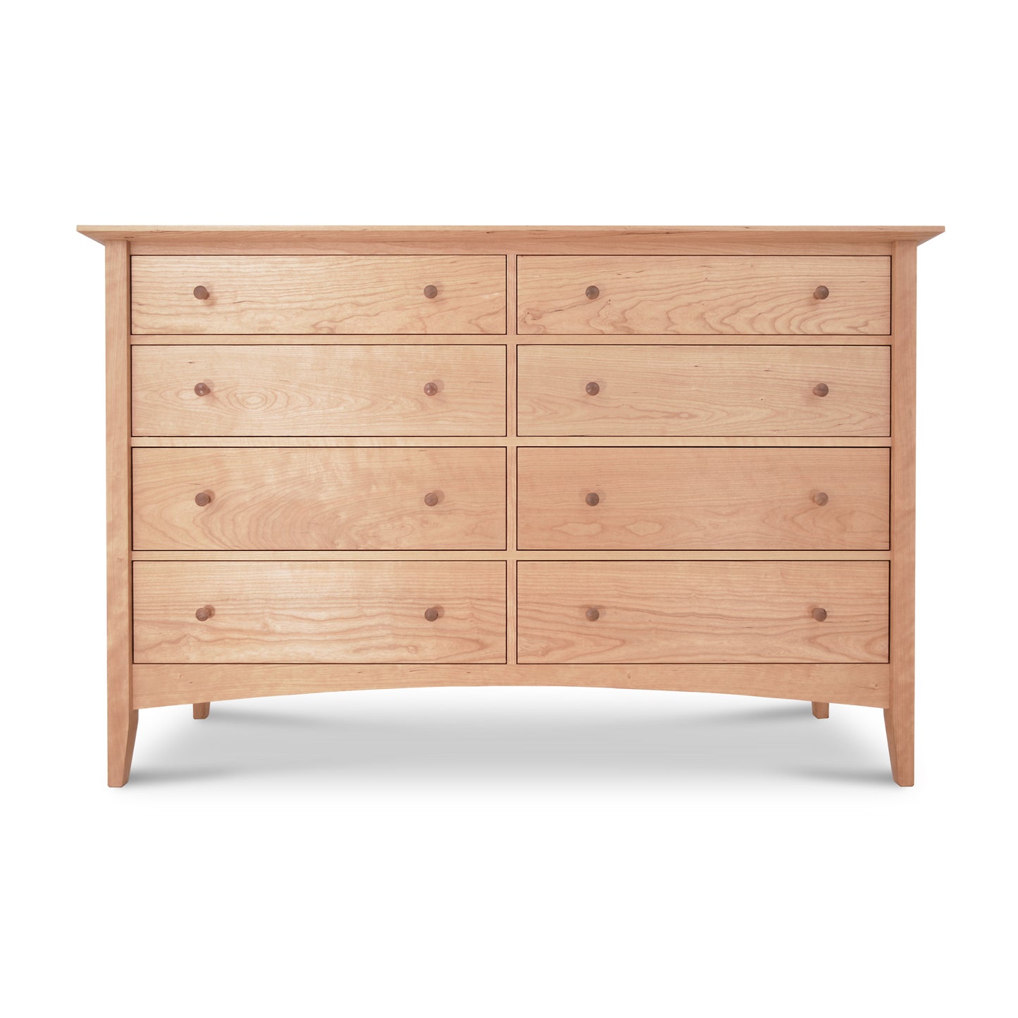 A Maple Corner Woodworks American Shaker 8-Drawer Dresser featuring seven drawers, with four large drawers on the bottom and three smaller drawers on top. The dresser stands on four slanted legs and has a smooth finish.