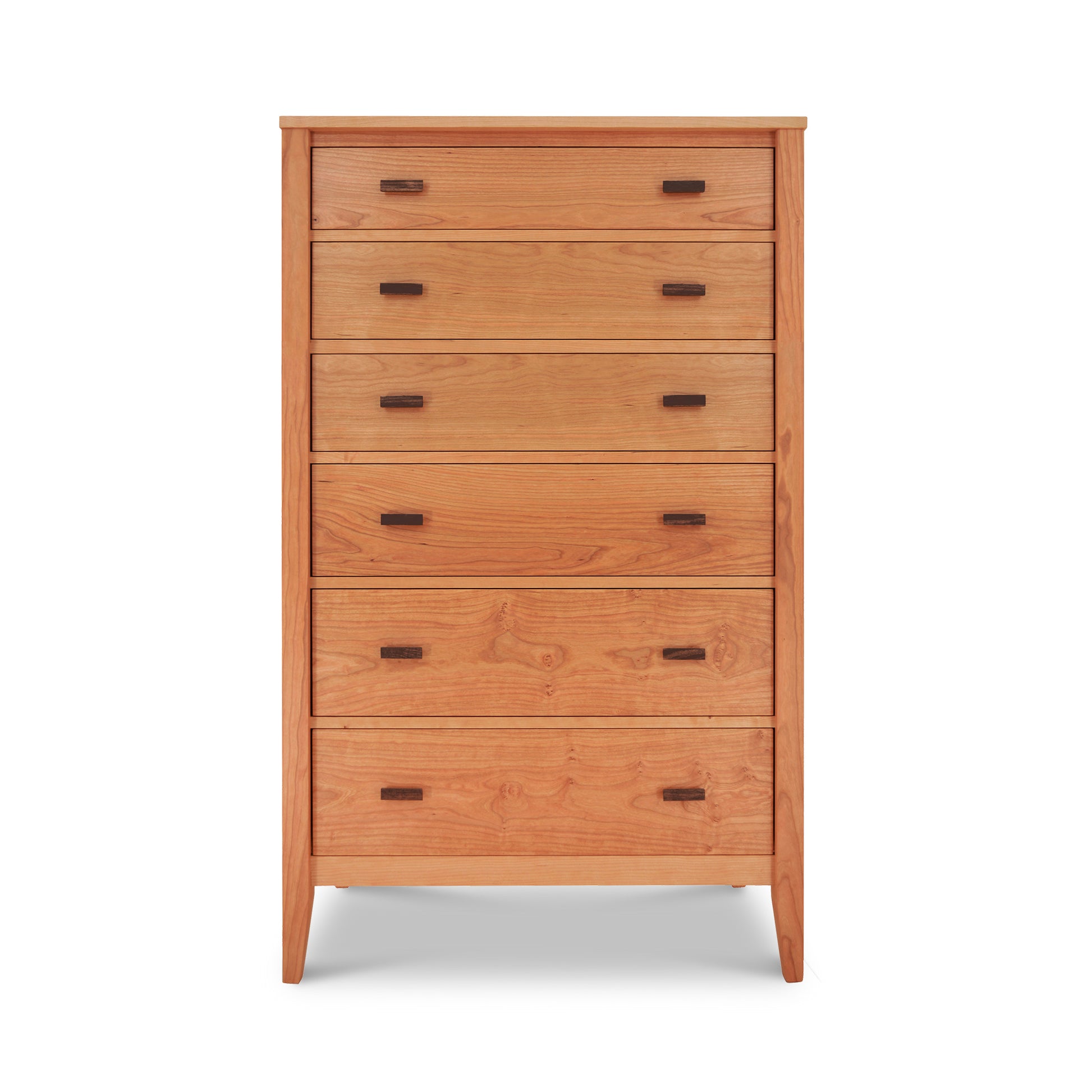 A tall, wooden dresser made from sustainably harvested natural cherry, with six evenly spaced drawers, each featuring a simple horizontal pull-handle, standing against a plain white background. This is the Andover Modern 6-Drawer Chest by Maple Corner Woodworks.
