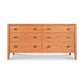A Maple Corner Woodworks Andover Modern 6-Drawer Dresser, featuring a natural cherry finish and simple rectangular handles, positioned against a plain white background.