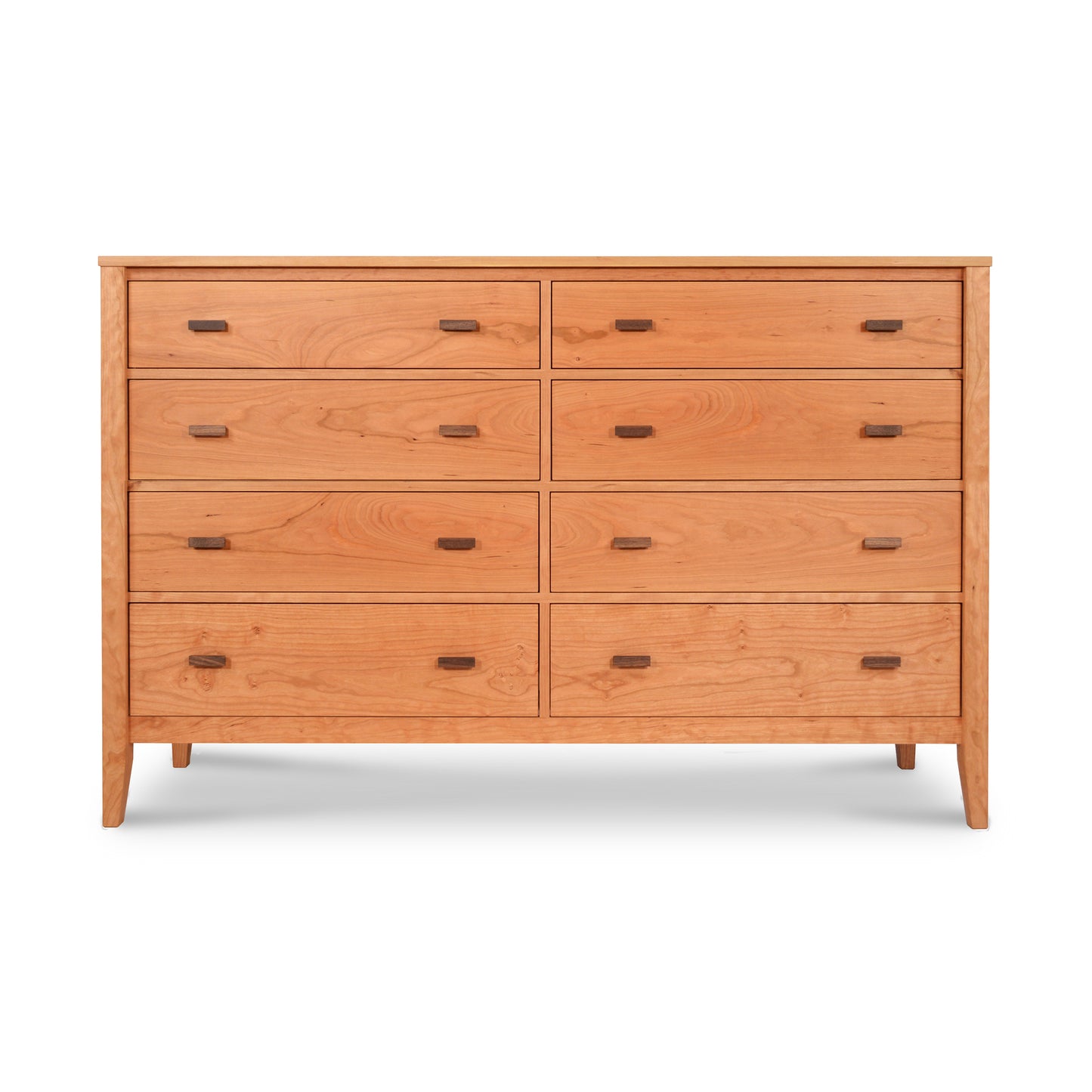 An eco-friendly dresser crafted from sustainably harvested materials, the Maple Corner Woodworks Andover Modern 8-Drawer Dresser features light-colored wood with black metal handles, positioned against a white background. This dresser boasts a