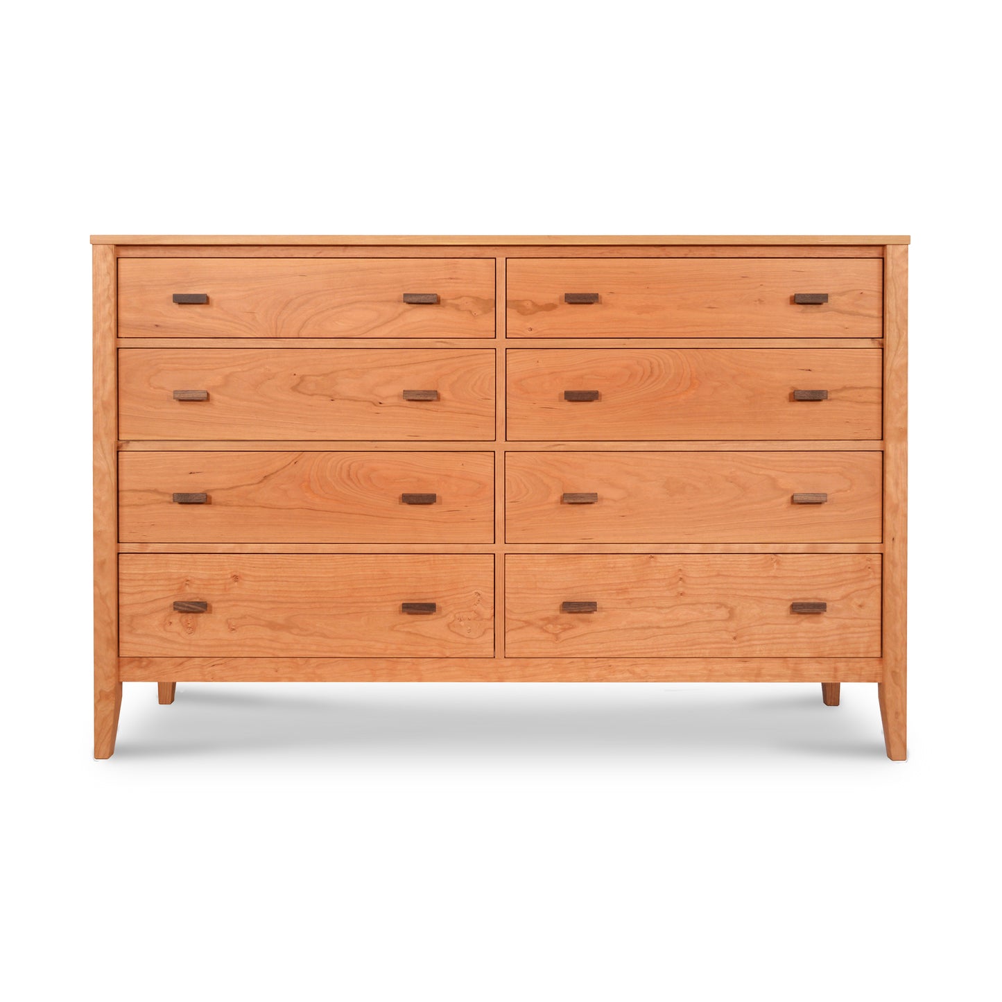 Andover Modern 8-Drawer Dresser by Maple Corner Woodworks showcases a natural finish and minimalist rectangular handles, offering stylish practicality. Crafted from eco-friendly materials, this dresser provides ample storage with a sleek design for modern interiors.