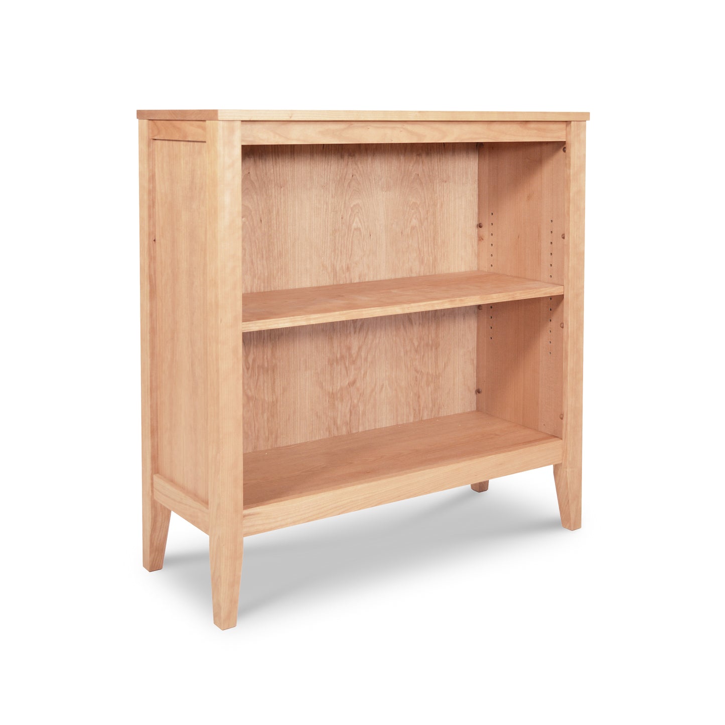 An Maple Corner Woodworks Andover Modern Bookcase, wooden with two shelves, empty and isolated on a white background.