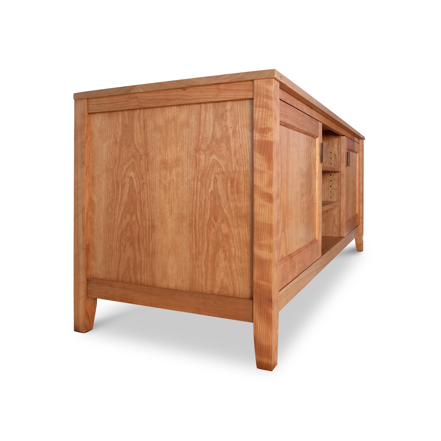 A Maple Corner Woodworks Andover Modern 64" TV Stand with a smooth finish, featuring panelled sides and two rows of small drawers at one end. This Vermont craftsmanship piece is isolated on a white background.