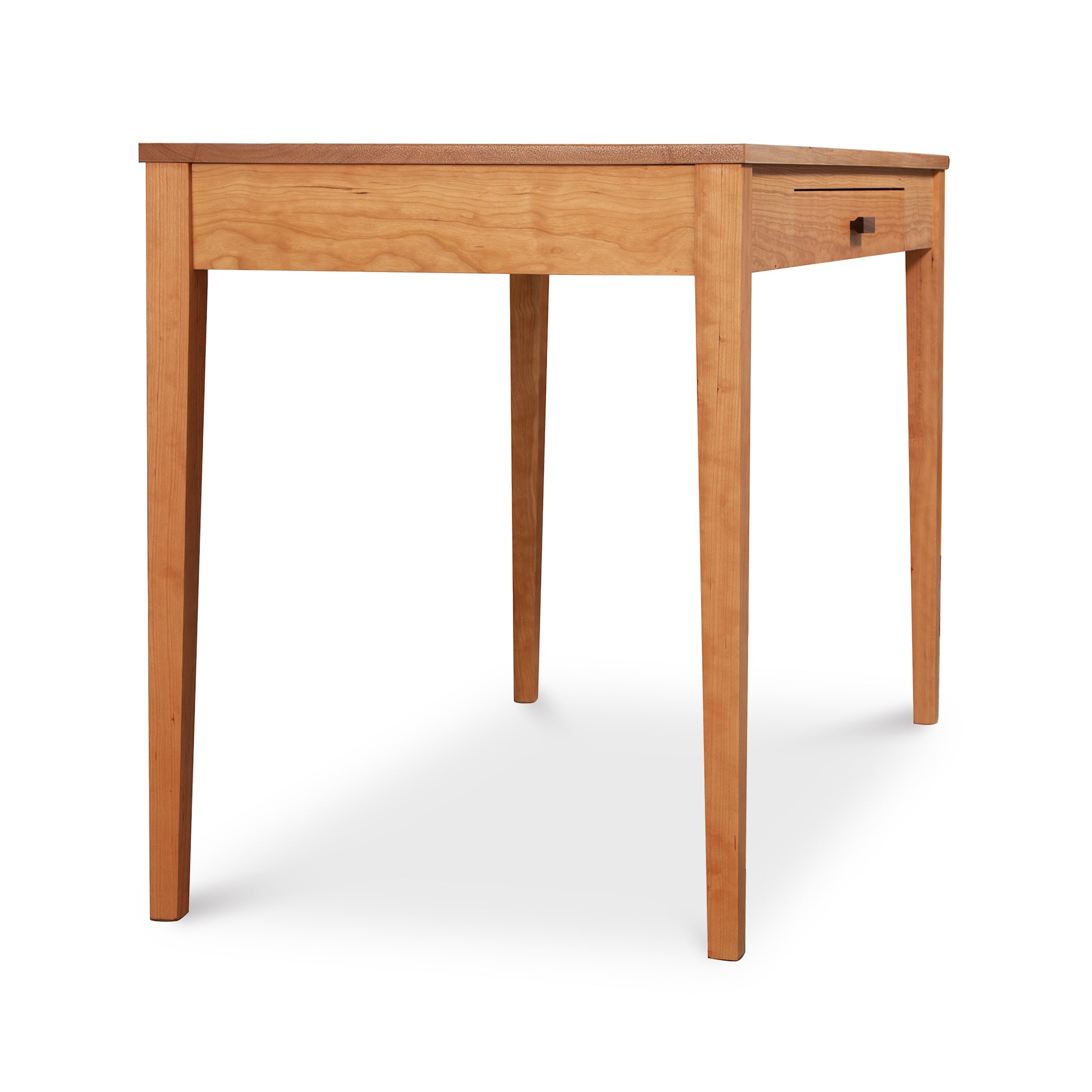 A Maple Corner Woodworks Andover Modern Writing Desk with a single drawer, isolated on a white background.