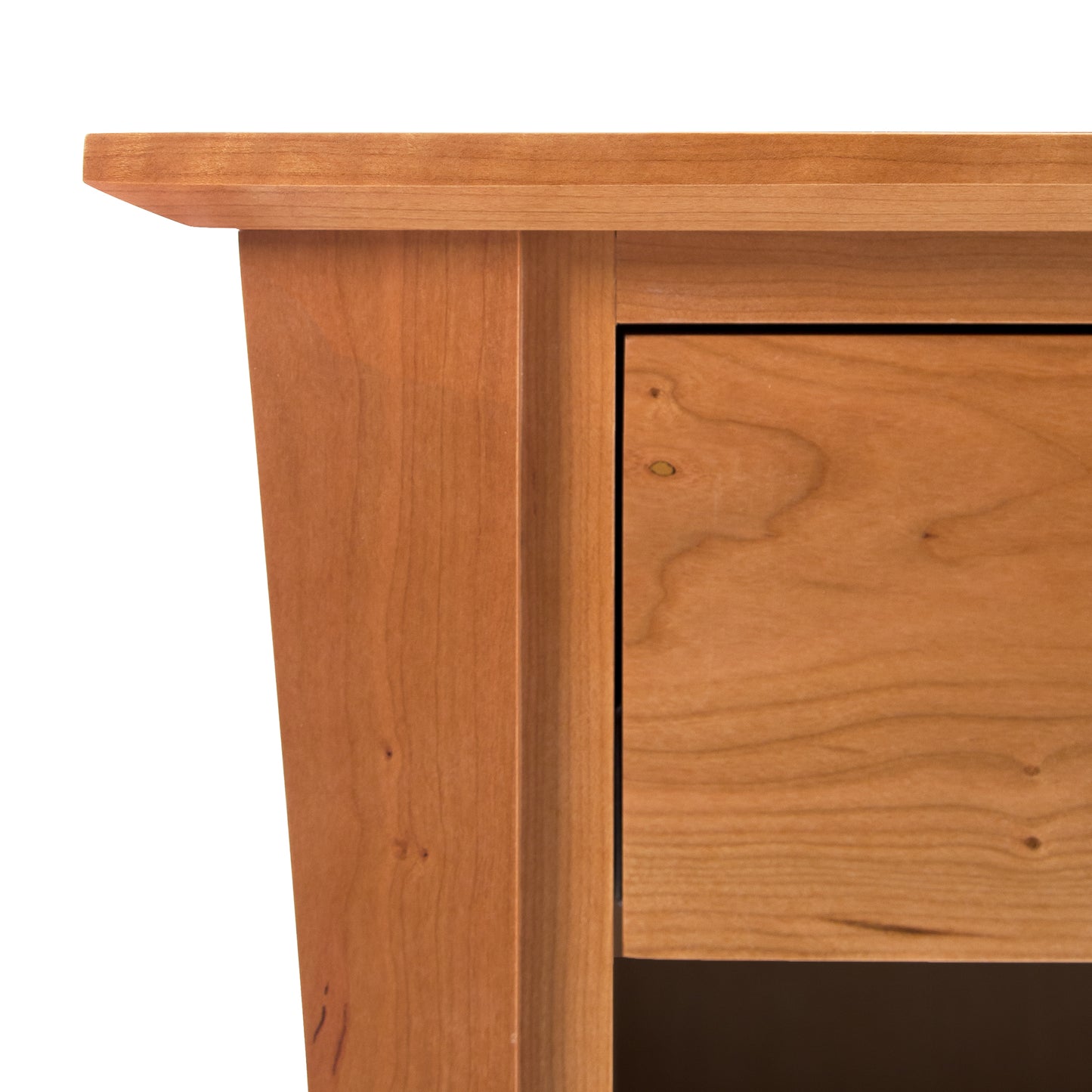 Lyndon Furniture Andrews 1-Drawer Nightstand features detailed wood grain and precise craftsmanship on its top left corner.