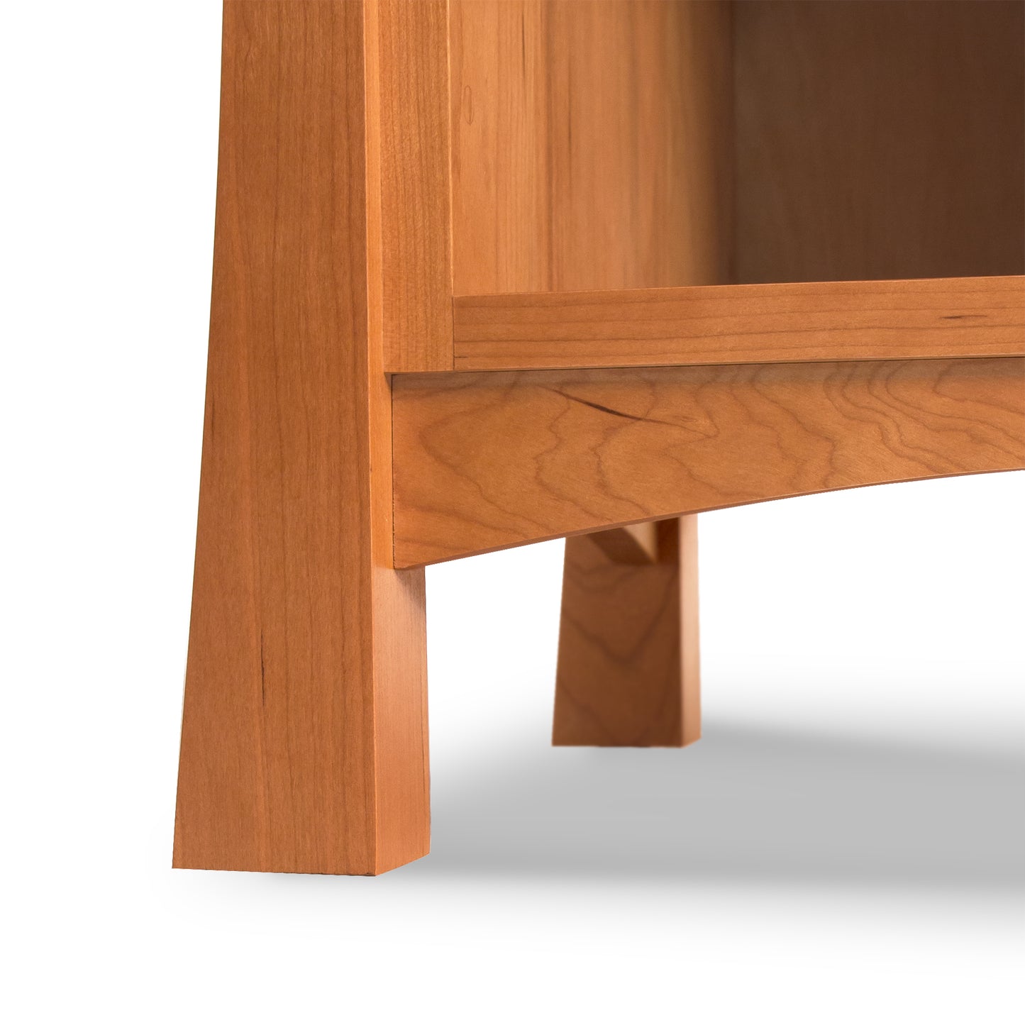 Andrews 1-Drawer Enclosed Shelf Nightstand by Lyndon Furniture with angular legs and a smooth natural wood finish, highlighting the nightstand’s elegant craftsmanship.