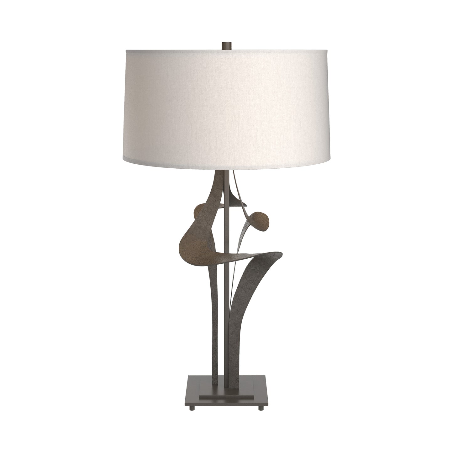 Antasia #2 Table Lamp with sculptural forged metal base and white cylindrical shade, crafted by Hubbardton Forge.