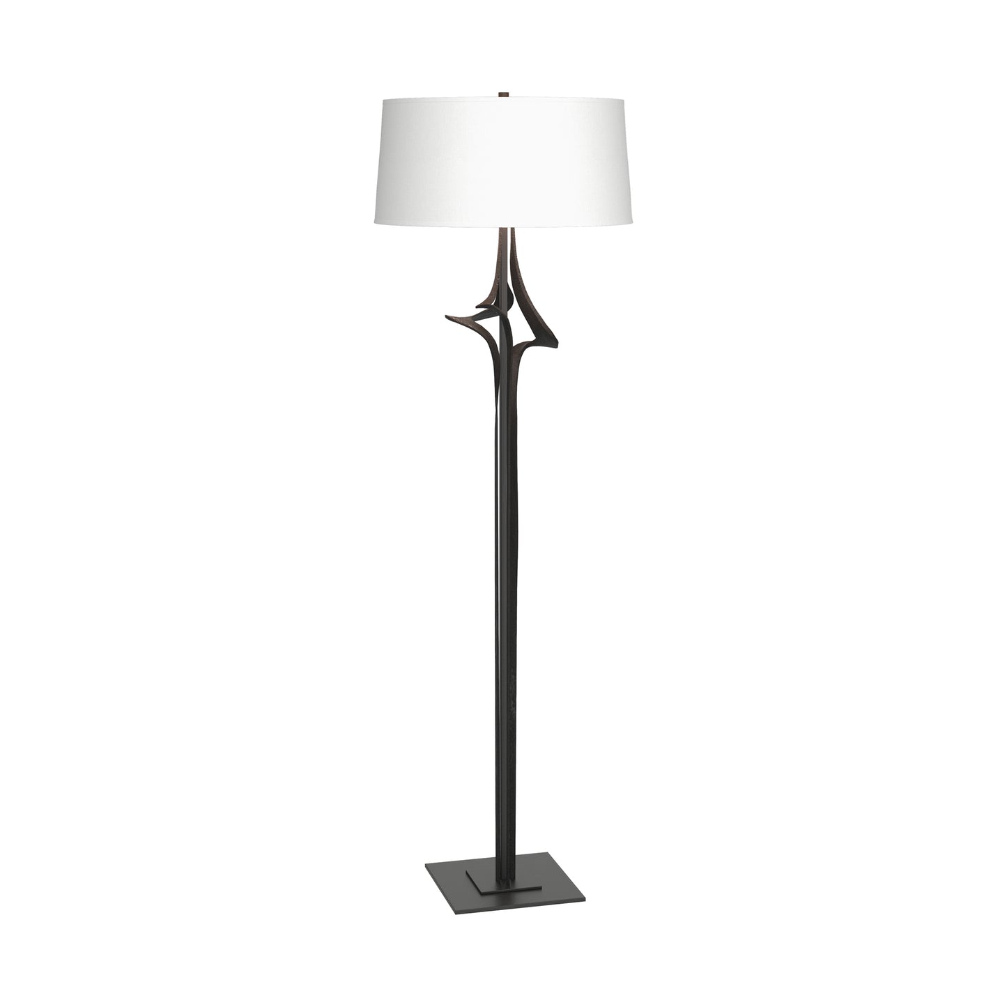 Hubbardton Forge Antasia Floor Lamp with handcrafted metal frame, white drum shade, and slender dark stand on a square base.