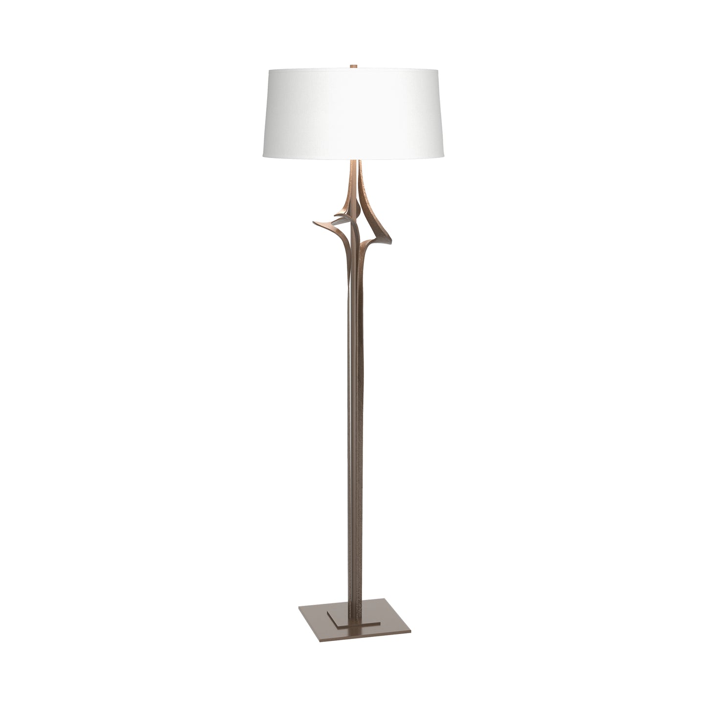 Antasia Floor Lamp by Hubbardton Forge shown with a sculptural metallic stand and white drum shade, highlighting its artisan craftsmanship and contemporary design.