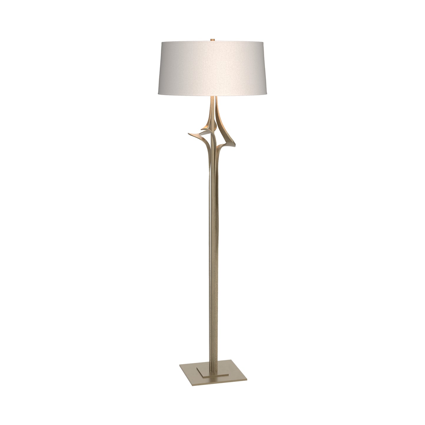 Antasia Floor Lamp by Hubbardton Forge with a tall metallic stand, branch-inspired detail, square base, and white drum shade.