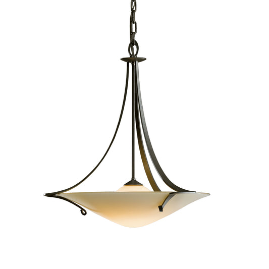 An elegant Hubbardton Forge pendant light fixture showcasing expert craftsmanship, featuring a graceful glass bowl suspended from a delicate chain.