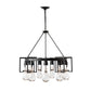 A Hubbardton Forge Apothecary Circular Chandelier with clear bulbs hanging from it.