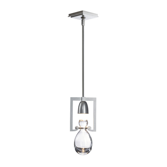 Hubbardton Forge Apothecary Mini Pendant with a square metal frame, hand-blown clear glass shade, and industrial steel rod detailing.