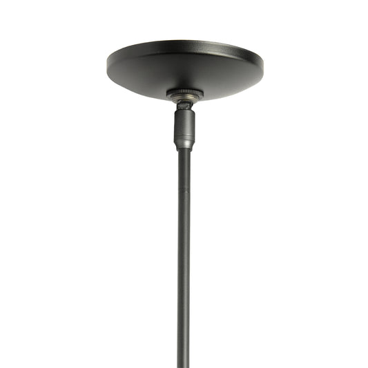Black Mini Pendant Light with round canopy and slim rod by Hubbardton Forge, highlighting industrial Vermont craftsmanship.