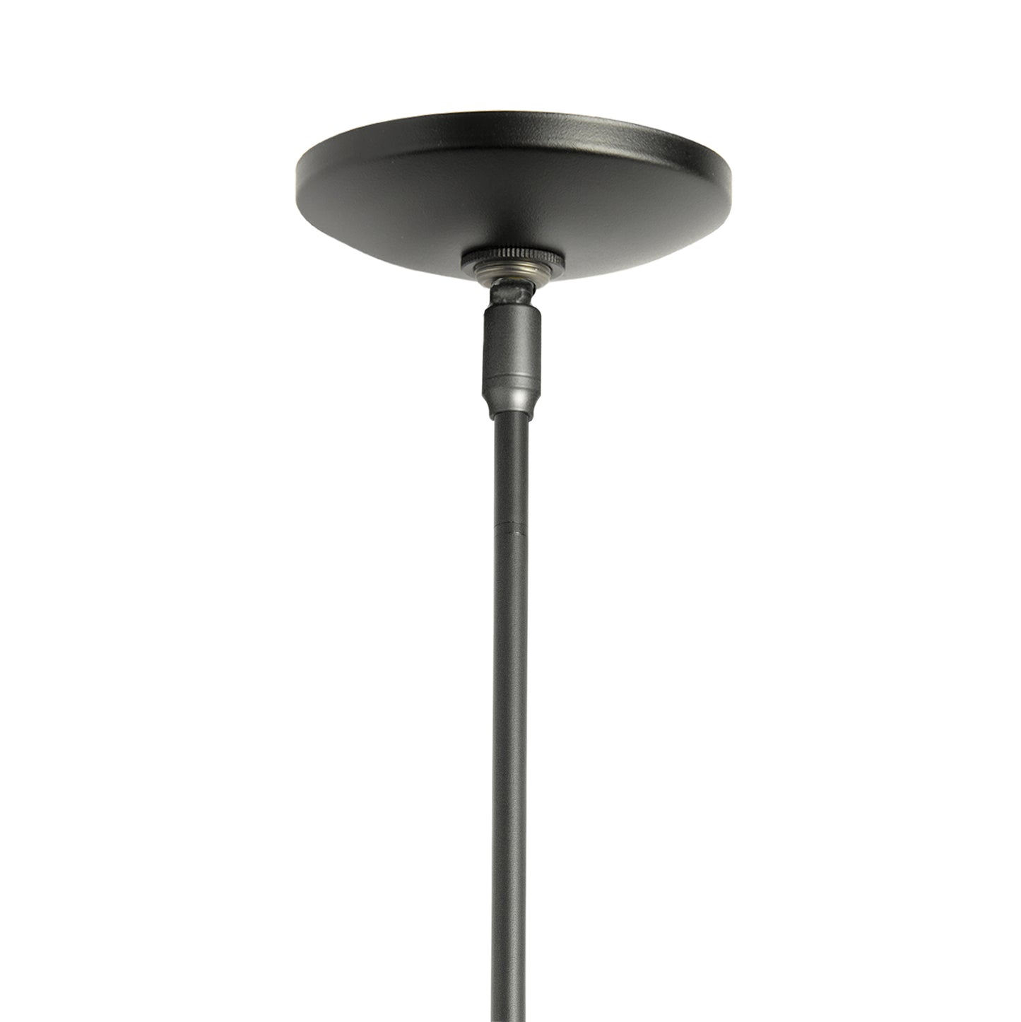 Black Mini Pendant Light with round canopy and slim rod by Hubbardton Forge, highlighting industrial Vermont craftsmanship.