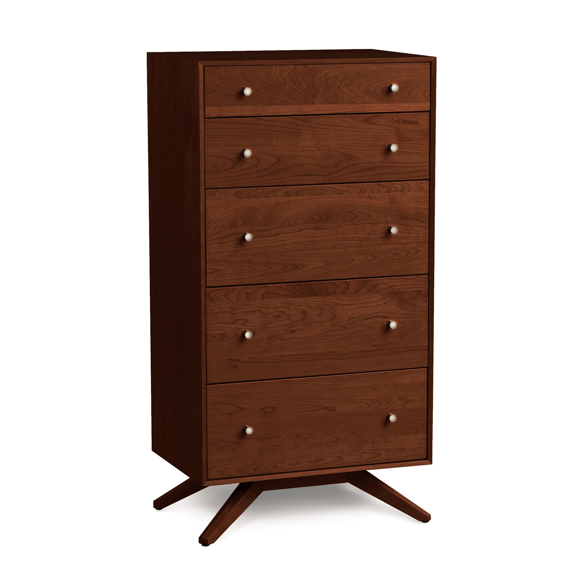 Astrid 5-Drawer Chest by Copeland Furniture in solid cherry with silver handles and splayed legs, showcasing Scandinavian design.