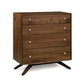 A hardwood Copeland Furniture Astrid 4-Drawer Chest with white round knobs and angled legs on a white background.
