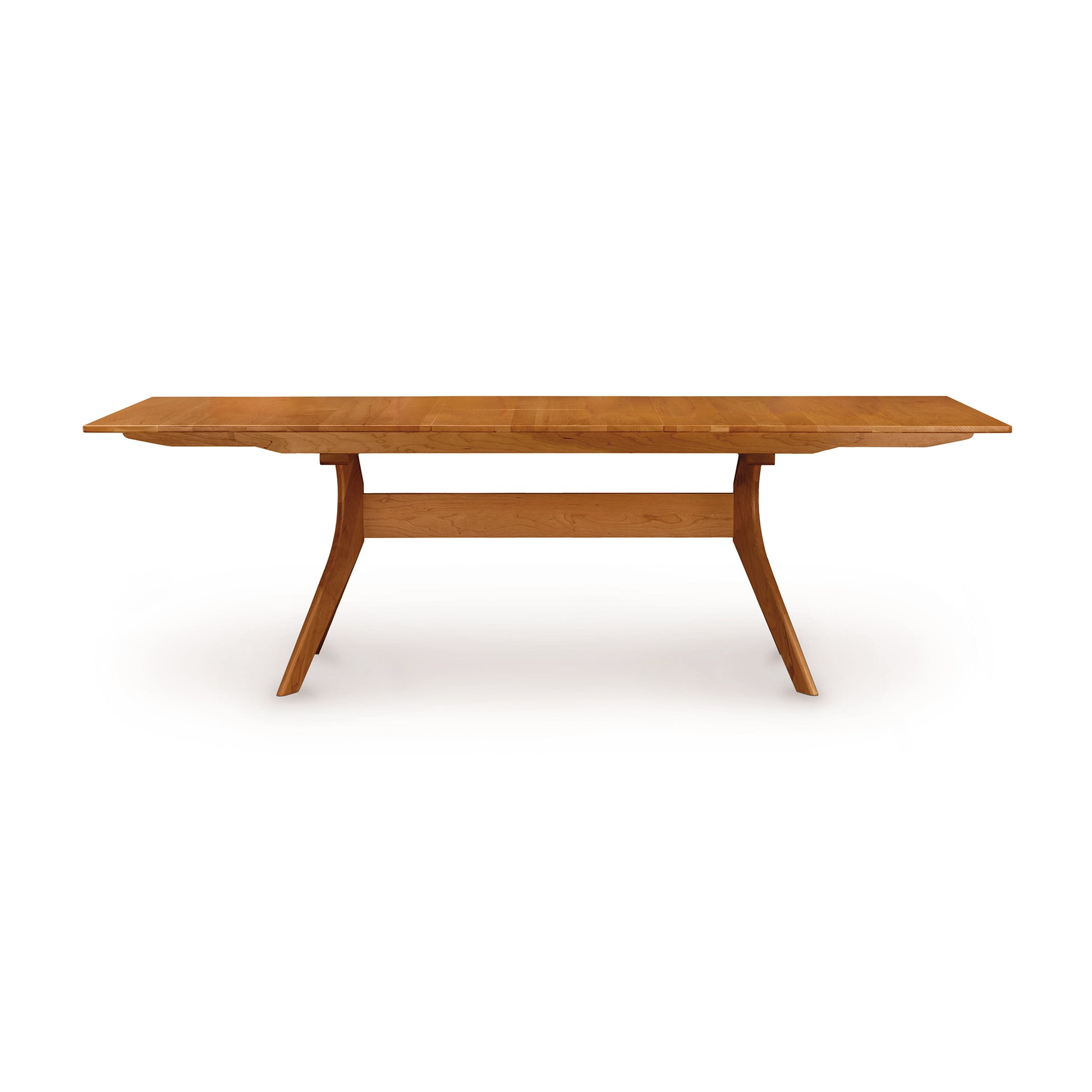 Audrey Extension Dining Table by Copeland Furniture, crafted from solid wood with curved legs and a sleek finish.