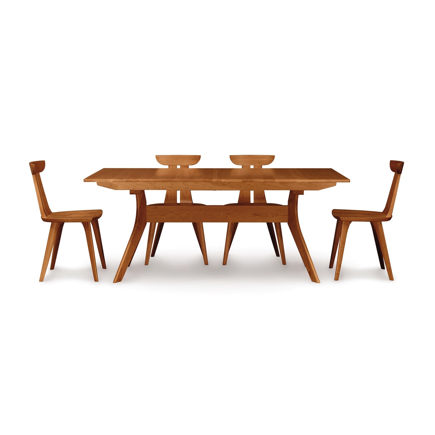 A wooden dining table with four chairs.