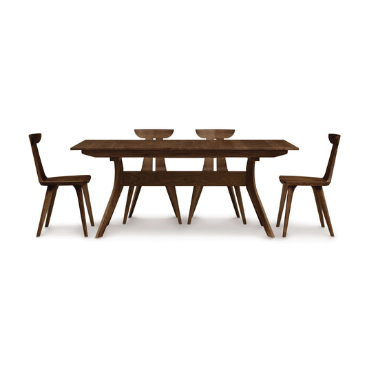 Audrey Extension Dining Table by Copeland Furniture with four matching chairs, featuring elegant hardwood construction and a sleek, modern design.
