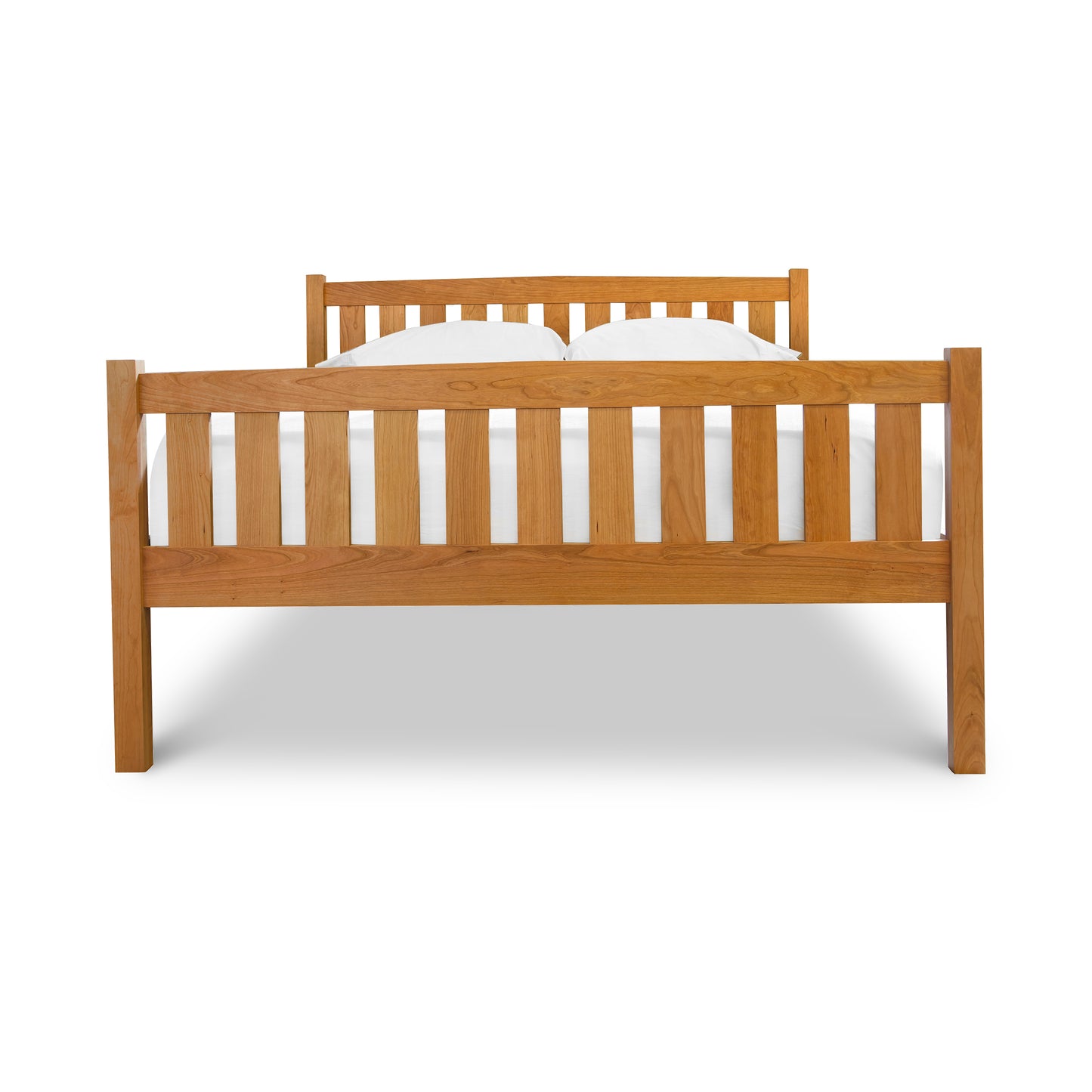 Bennington Bed with High Footboard by Vermont Furniture Designs, showcasing vertical slats and solid wood craftsmanship, viewed from the front.