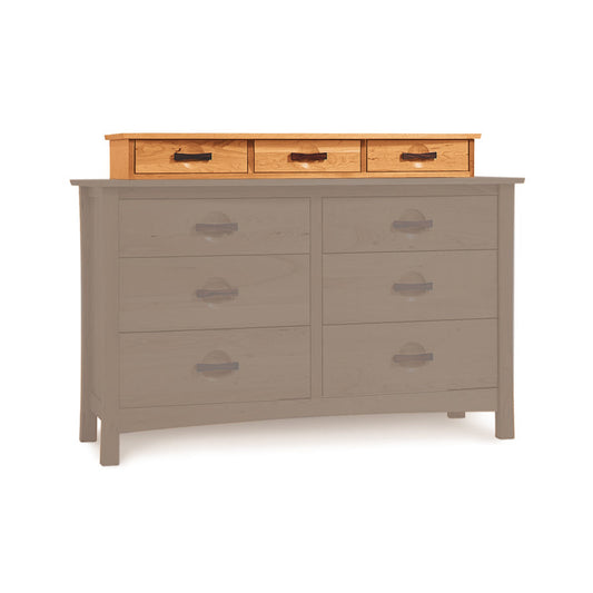 A Berkeley Accessory Case from Copeland Furniture with a light grey finish and three rows of drawers, the top row consisting of smaller drawers with a natural wood finish and dark handles, and the lower two rows.