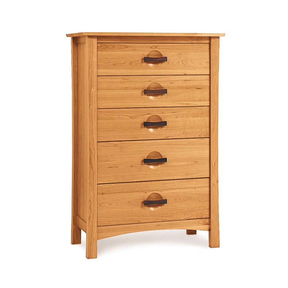 A wooden chest of drawers with four drawers.