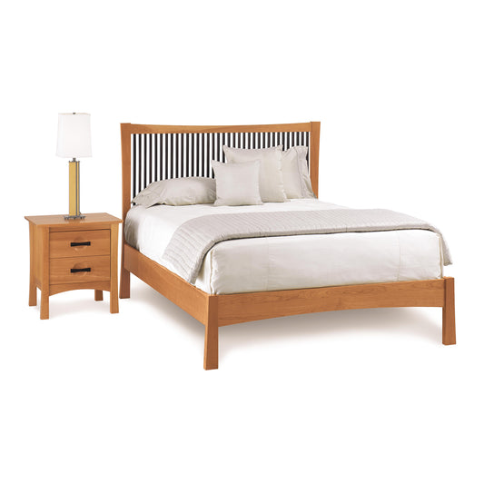 Copeland Furniture Berkeley Platform Bed in queen size with white bedding, crafted in solid wood, shown with a coordinated nightstand.